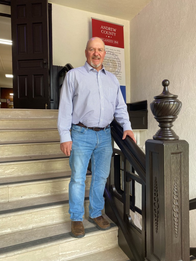 Fritz Hegeman standing in on the stairs of Andrew County City Hall.