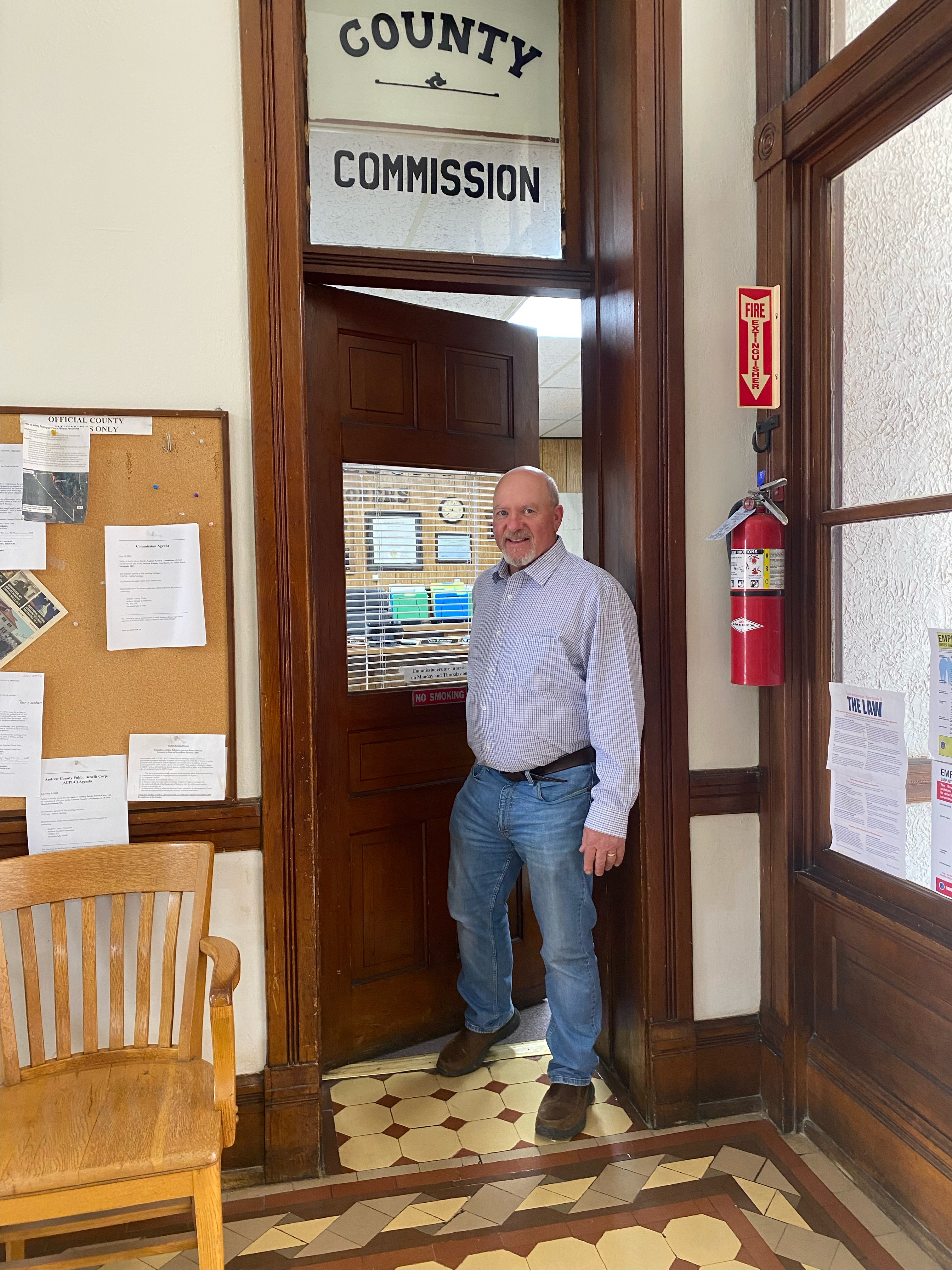 Fritz Hegeman East District Andrew County Commissioner outside courthouse commissioner office.
